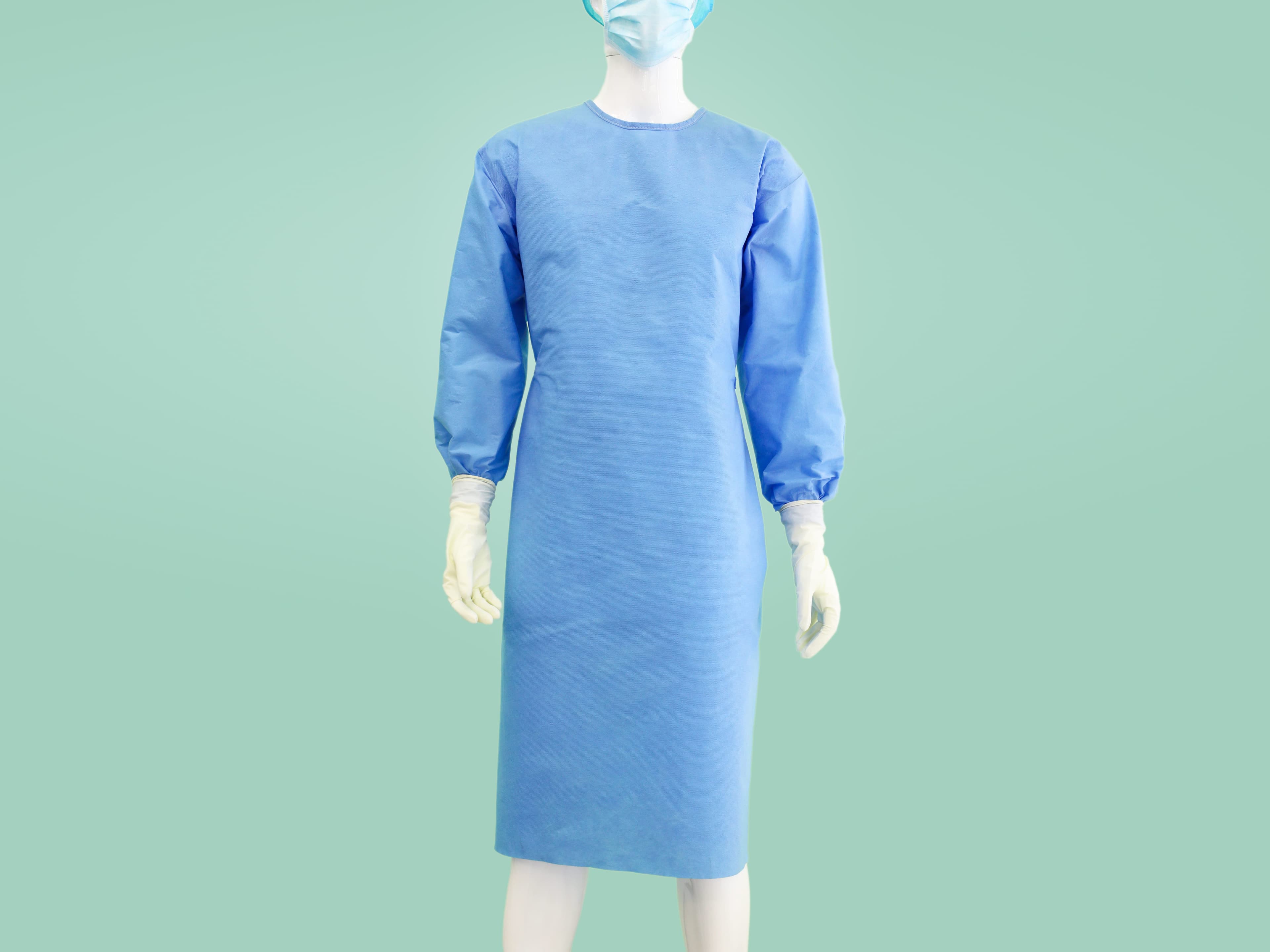 Real full-length disposable surgical gown displayed for product review