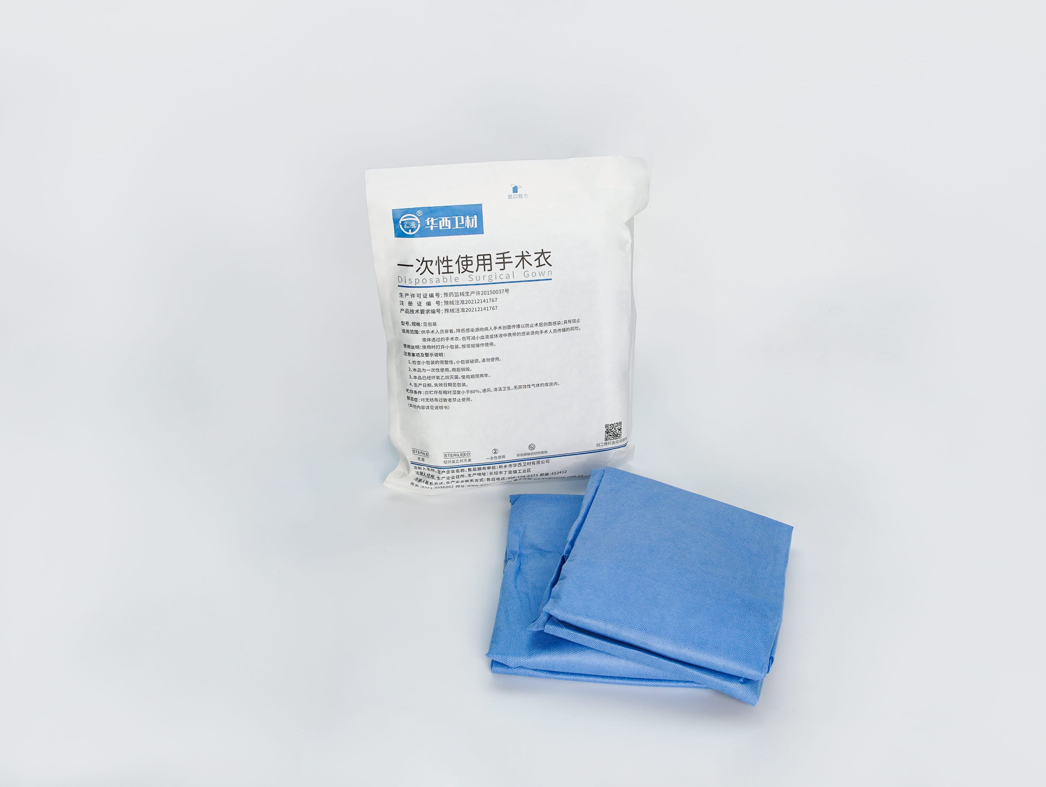 Real disposable surgical gown and labeled packaging prepared for OEM review