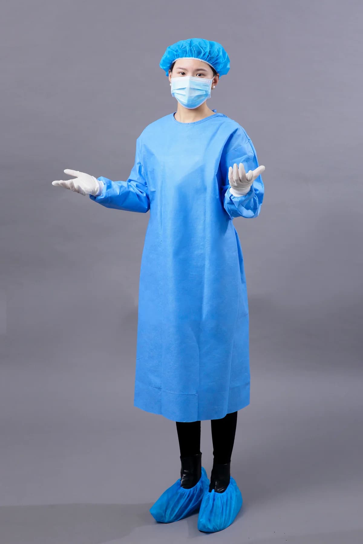 Real standard surgical gown shown on a mannequin for product comparison